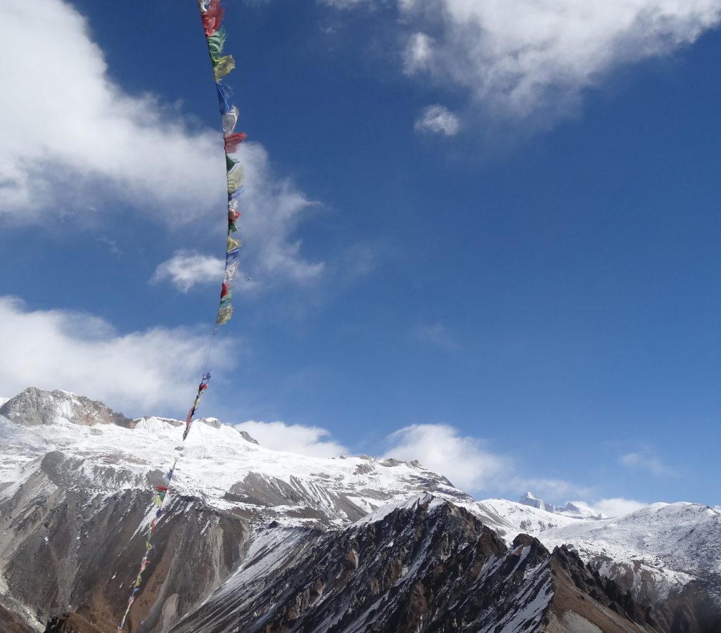 Snow peak with Buddhist flag